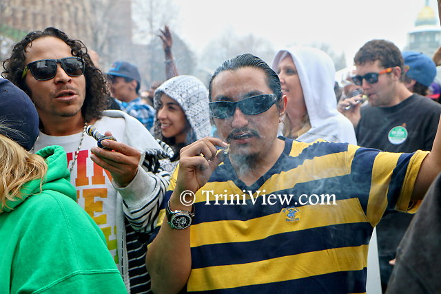 Patrons of the 4/20 Rally enjoy a smoke