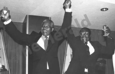 President Mugabe gives a toast to a closer relationship between Zimbabweans and progressive South Africans and to peace and prosperity in 1990.